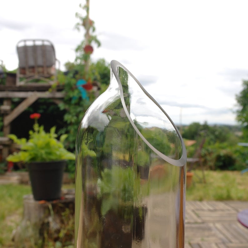 Handcrafted carafe in recycled glass